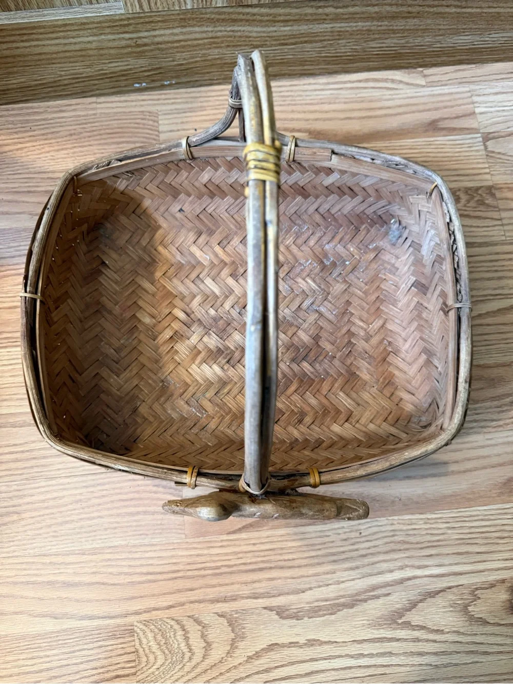 Vintage Zhejiang Chinese woven rattan and wood handled basket with a carved